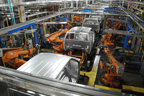 gif of machines building cars